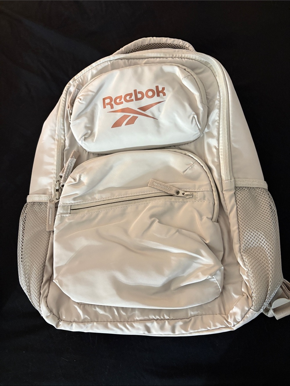 Reebok Men’s Light Cream Backpack with Rose Logo